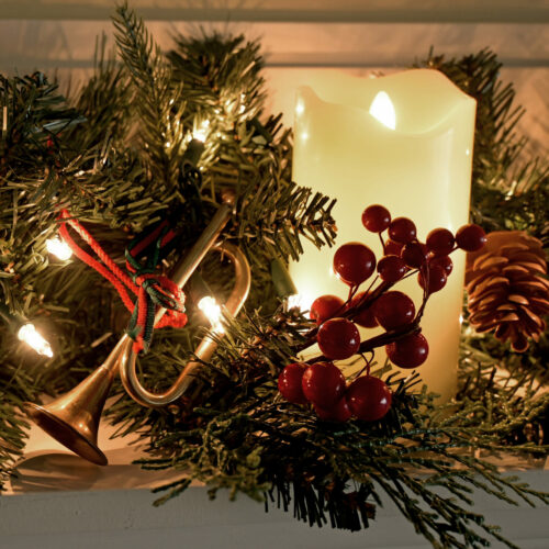 Image of a mantle decorated for the holidays